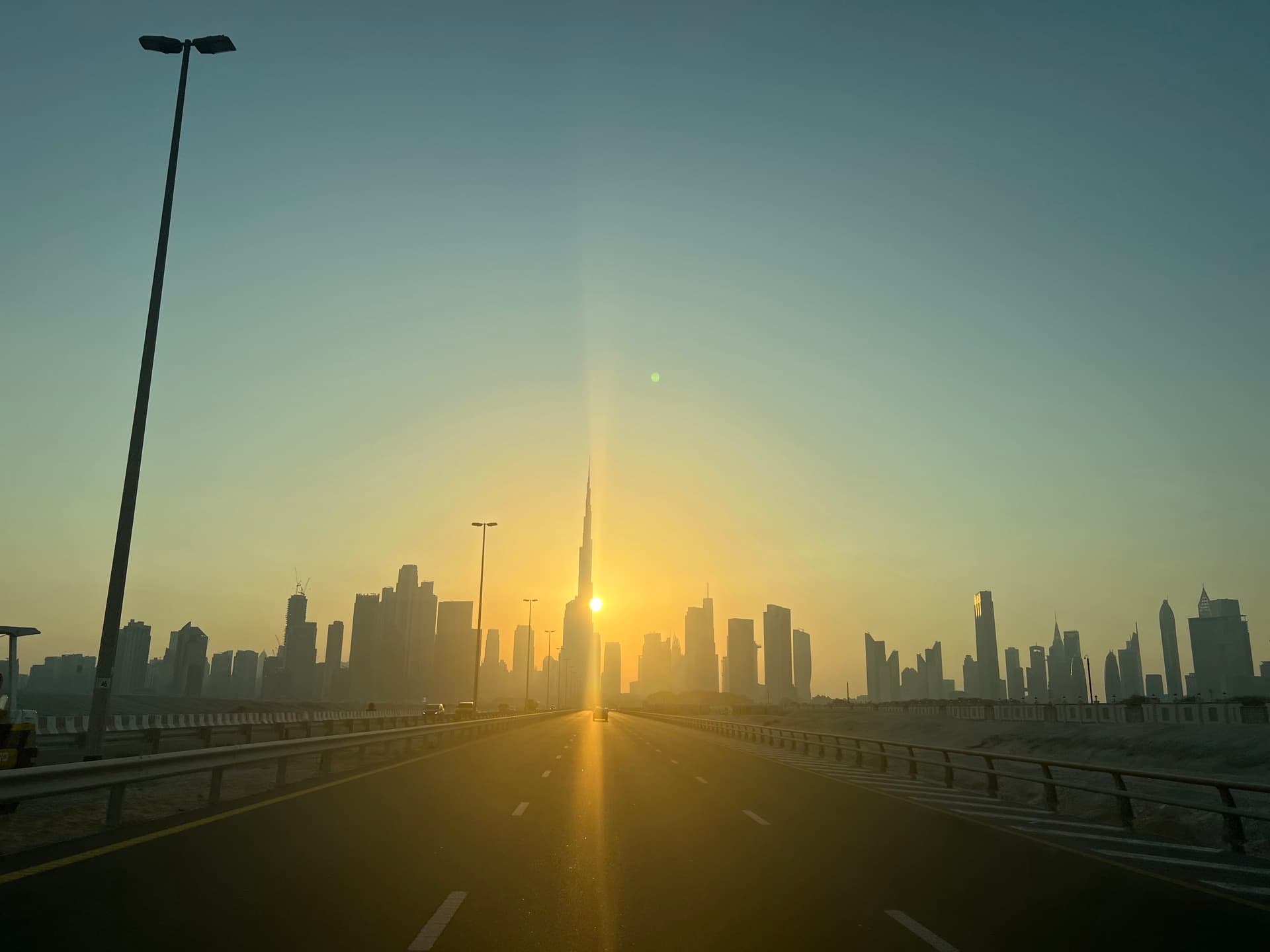 Burj Khalifa and the Dubai skyline at sunset