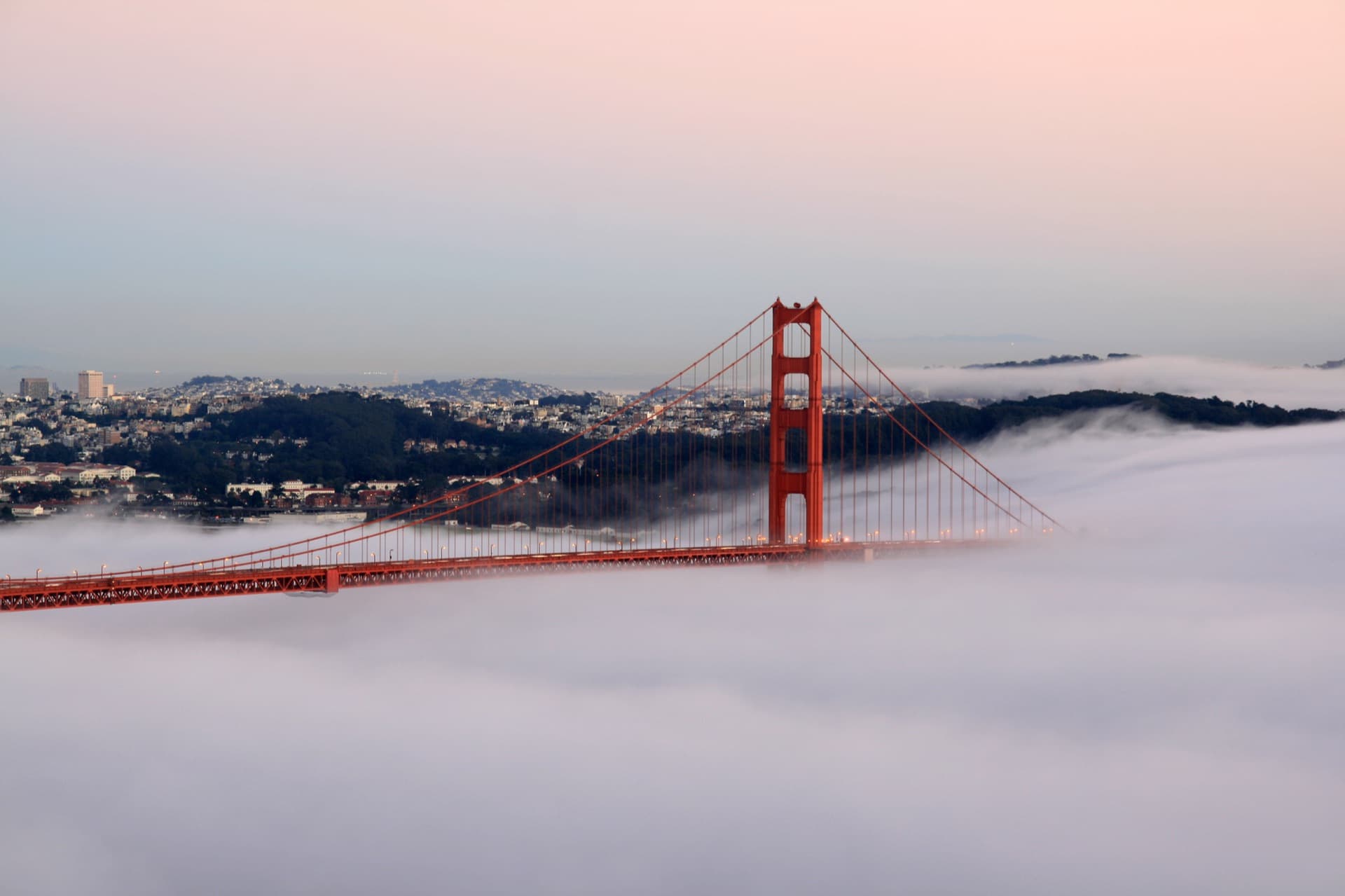 The Golden Gate Bridge above the fog, San Francisco